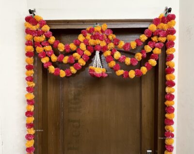 Sphinx artificial marigold fluffy flowers and rajnigandha buds triple line big door toran light orange and red 3
