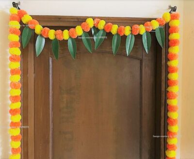 sphinx artificial fluffy marigold and mango leaves door toran single line mid section big door toran 2